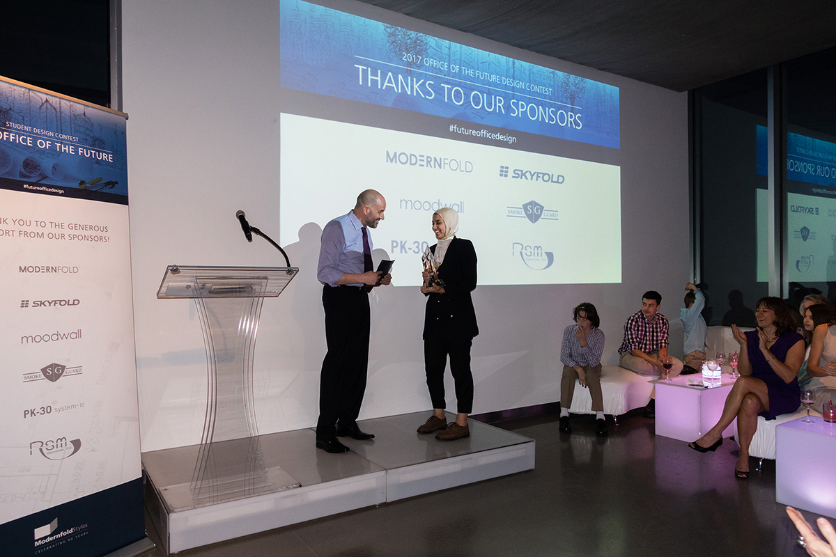 Bob Styles awarding Sara Ebrahim, winner of the 2017 Design Contest