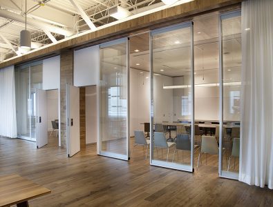 ACOUSTI-CLEAR MOTORIZED GLASS WALLS